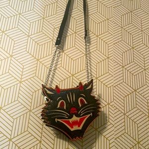 Sourpuss purse